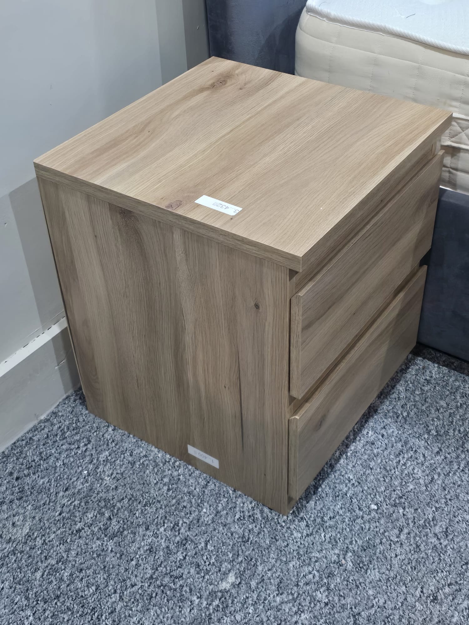 Oak-effect two-drawer bedside cabinet